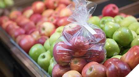 Apples bagged and closed with a kwik lok closure and label